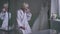 Reflection of depressed senior woman crying sitting in bathroom with white elegant wedding dress. Sad Caucasian retiree