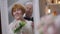 Reflection of excited senior bride with groom hugging smiling woman in slow motion. Happy Caucasian redhead lady and