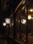 Reflection in the glass, on the street, night, multicolored, cast iron lanterns