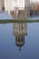 Reflection of the Great Church in Deventer, the Netherlands, in a flooded meadow