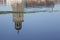 Reflection of the Great Church in Deventer, the Netherlands, in a flooded meadow