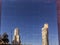 Reflection of high-rise buildings and bright blue sky in a glass facade in Istanbul, Turkey