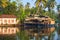 Reflection houseboat and house in kerala backwaters