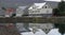 reflection of the houses on the sea water, Akureyri, Iceland