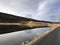 reflection in Iceland lake and cabin