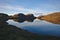 Reflection on the loch. North of Scourie, Sutherland, North West Scotland, UK