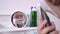 Reflection of man with shaving foam on face in mirror