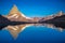 Reflection of the Matterhorn on blue lake at sunrise, Swiss Alps, Zermatt