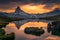 Reflection of matterhorn in mountain lake at sunset