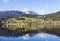 Reflection of mountain village in Hallstatter See, Austria, Euro