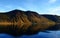 Reflection of mountains on the water in the fjords in Norway