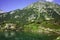 Reflection of Muratov peak in Okoto lake, Pirin Mountain