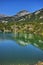 Reflection of Muratov peak in Okoto lake, Pirin Mountain