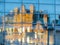 Reflection of the old building The Corn Exchange in windows of modern shopping center