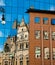 Reflection of an old building in new glass building. Old architecture versus modern reflected in glass. City of Liberec