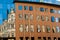 Reflection of an old building in new glass building. Old architecture versus modern reflected in glass. City of Liberec