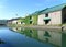 Reflection of The Old Warehouse along Otaru Canal with a Flying Seagull