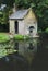 Reflection of an old water pumping house