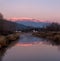 Reflection of Olympus at Sunrise in the river in Greece.