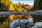 Reflection of peak Krivan in river. High Tatras mountains, Slovakia