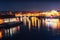 Reflection of Prague caste and the Charles bridge at dusk.