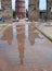 Reflection of Qutb Minar Minaret also spelled as Qutub Minar. Delhi, India