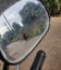 reflection from the rear view mirror of the motor