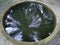 Reflection scene on the surface of the concrete well fill with water