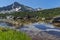 Reflection of Sivrya peak in Banski lakes, Pirin Mountain