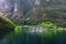 Reflection of small town in norwegian fiord, Norway