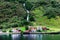 Reflection of small town in norwegian fiord, Norway