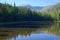 Reflection on Smreczynski lake in Koscieliska Valley, Tatras Mountains in Poland
