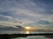 Reflection of Sunrise Horizon in Pal5 Beach, Namlea City, Buru Island