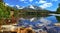 Reflection in tarn Srbske pleso in High Tatras mountains, Slovakia