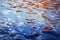 Reflection of tiled roofs in rippled water