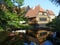 Reflection of Traditional Houses of the Open-air Museum `Den Gamle By` in Aarhus