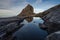 Reflection of Victoria mountain peak in Kinabalu mountains massif, Borneo island in Sabah state, Malaysia