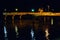 Reflection in water of light from colored lanterns in the state of Louisiana, USA