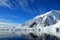 Reflections of antarctic mountain landscape