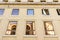 Reflections of the arena of Nimes, France, in a sunny day