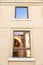 Reflections of the arena of Nimes, France, in a sunny day