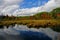 Reflections of autumn color at Algonquin, Canada