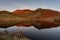 Reflections of Bryn Gwyn, and Clogwyngarreg in the Snowdonia National Park, Wales