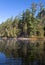 Reflections on a calm peaceful river in Algonquin Park