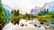 Reflections of Cathedral Rocks, Taft Point and Sentinel Dome in the Merced River in the smoke filled Yosemite Valley