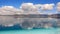 Reflections of clouds and mountain in Lake Salda in Turkey