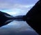 Reflections of clouds and sky on Cameron Lake, British Columbia