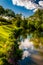 Reflections of clouds and trees in Antietam Creek, at Antietam National Battlefield