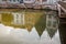 Reflections in the Dijle river of the historical houses at the Haverwerf in Mechelen, Belgium