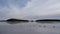 Reflections of frozen buoy in Runn lake near Falun in Sweden